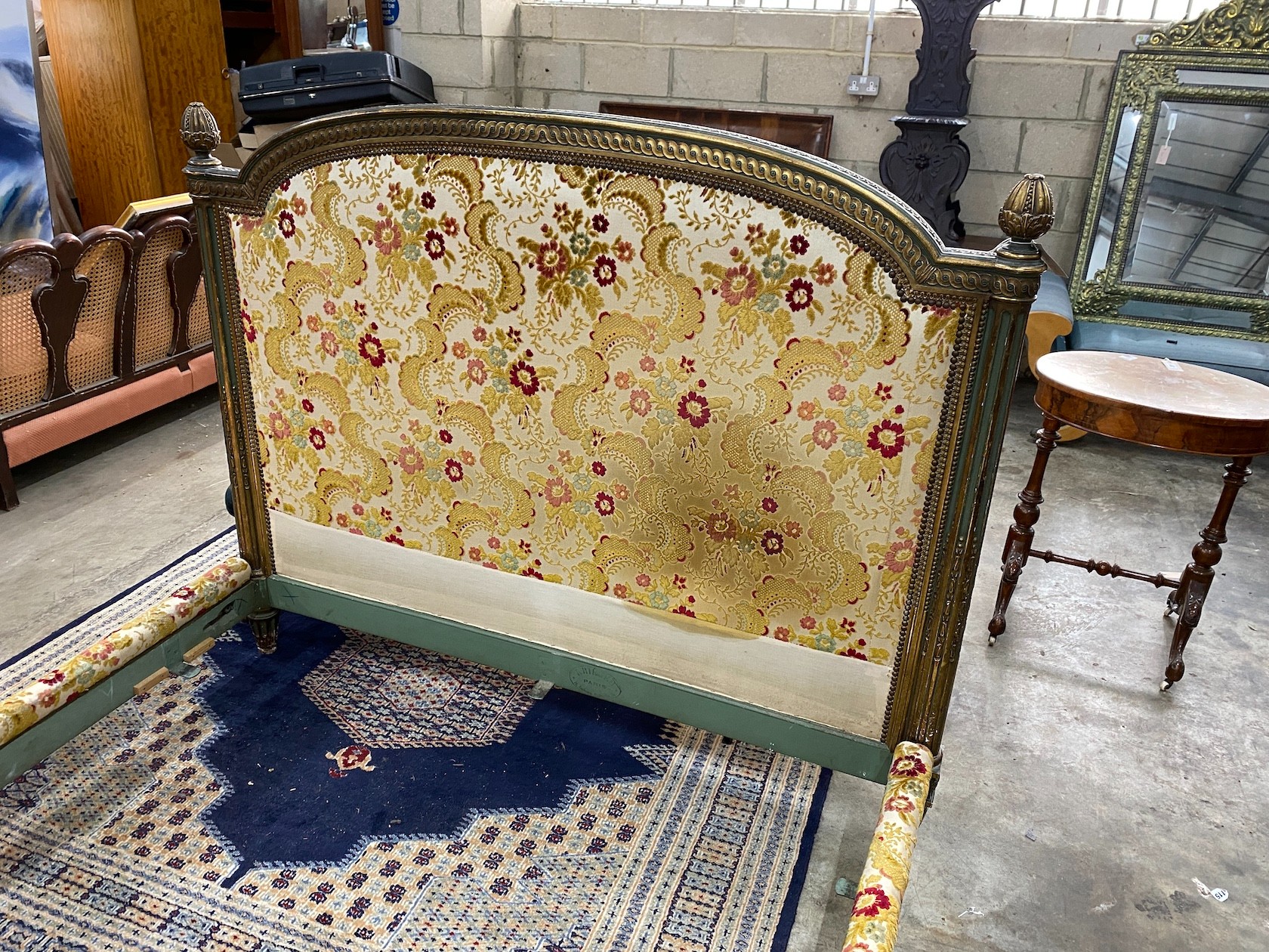 A Louis XVI style carved parcel gilt double bedframe, width 160cm, length 224cm, height 127cm